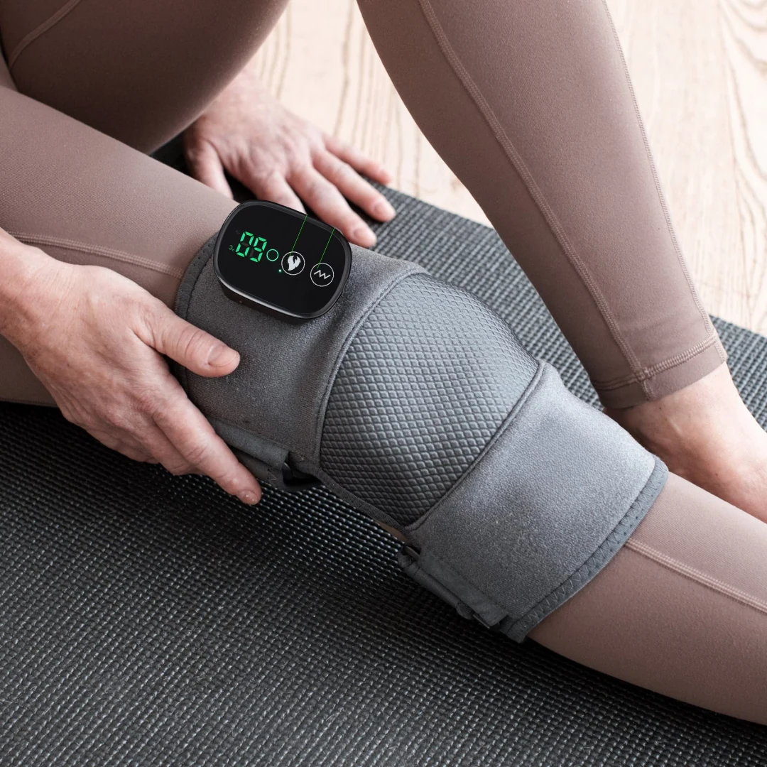 Adjusting the control panel on a wrap worn on the knee